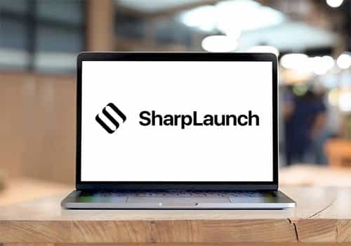 Sharplaunch logo on a laptop screen